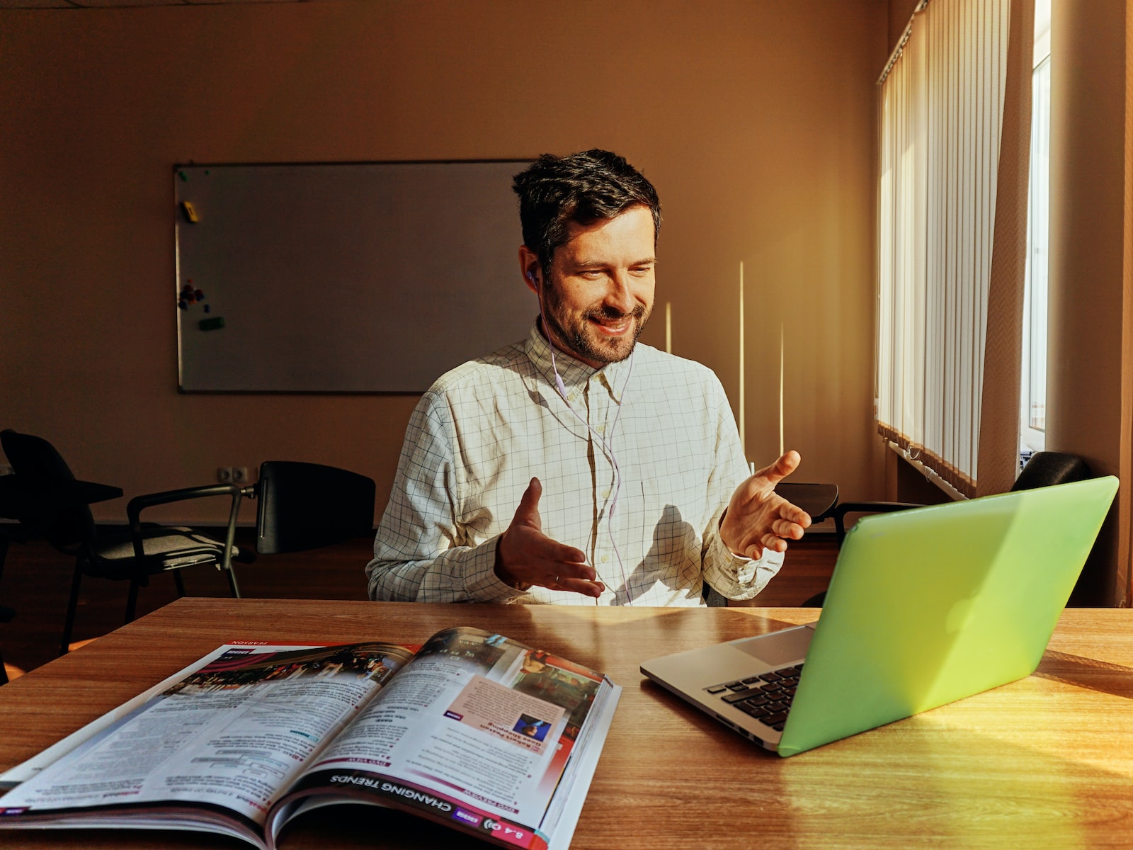 smiling man facing laptop 99-cent growth hack